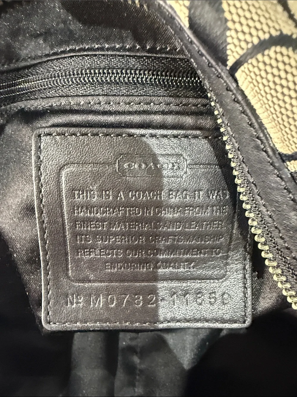 Coach Larg SOHO Signature Hobo Bag in Black and Tan